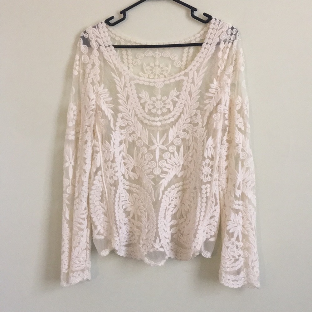 Sheer embroidered floral blouse